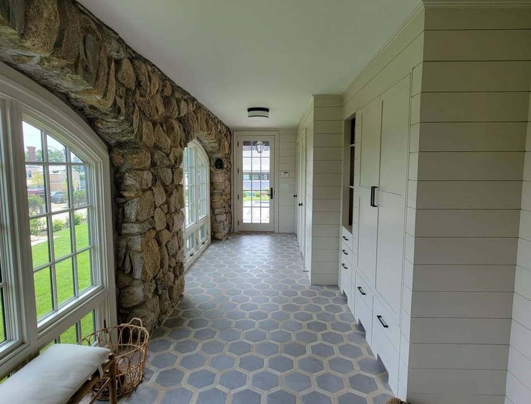 picture of a freshly tiled and remodeled luxury hallway in a luxury home